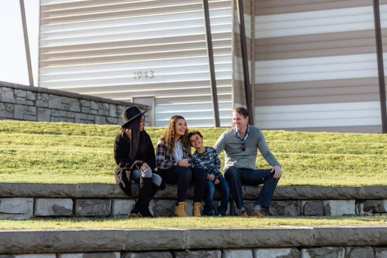 a happy family talking about personal insurance in Pasco, WA